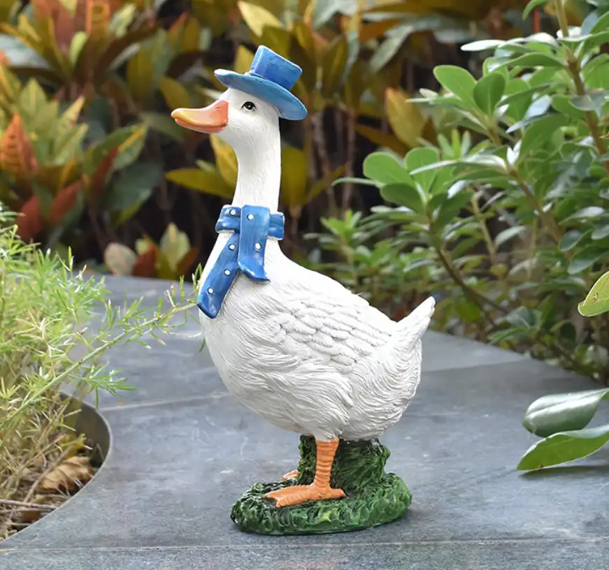 blue_hat_ceramic_duck_outdoor
